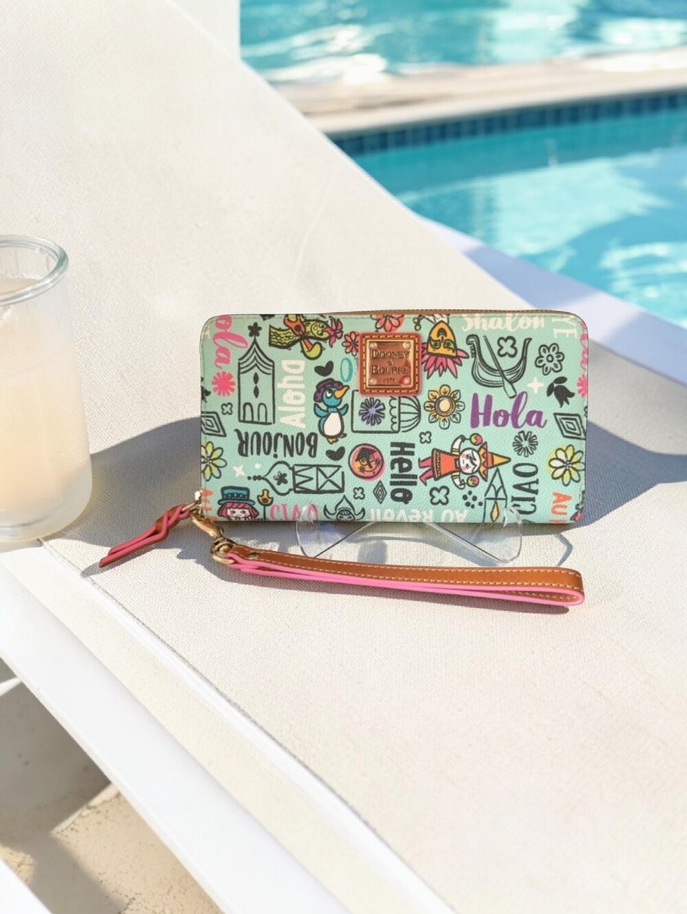 Brand NWOT Dooney & Bourke Disney "It's A Small World" Collaboration Wristlet